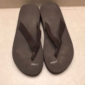 Brown wedged flip flops